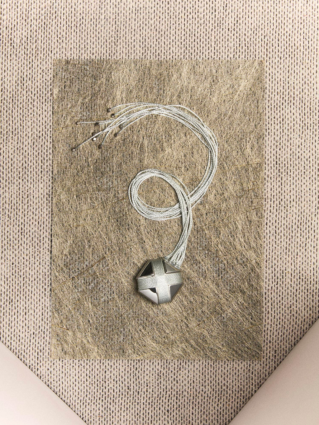 CURVED CROSS ROPE TASSEL BROOCH