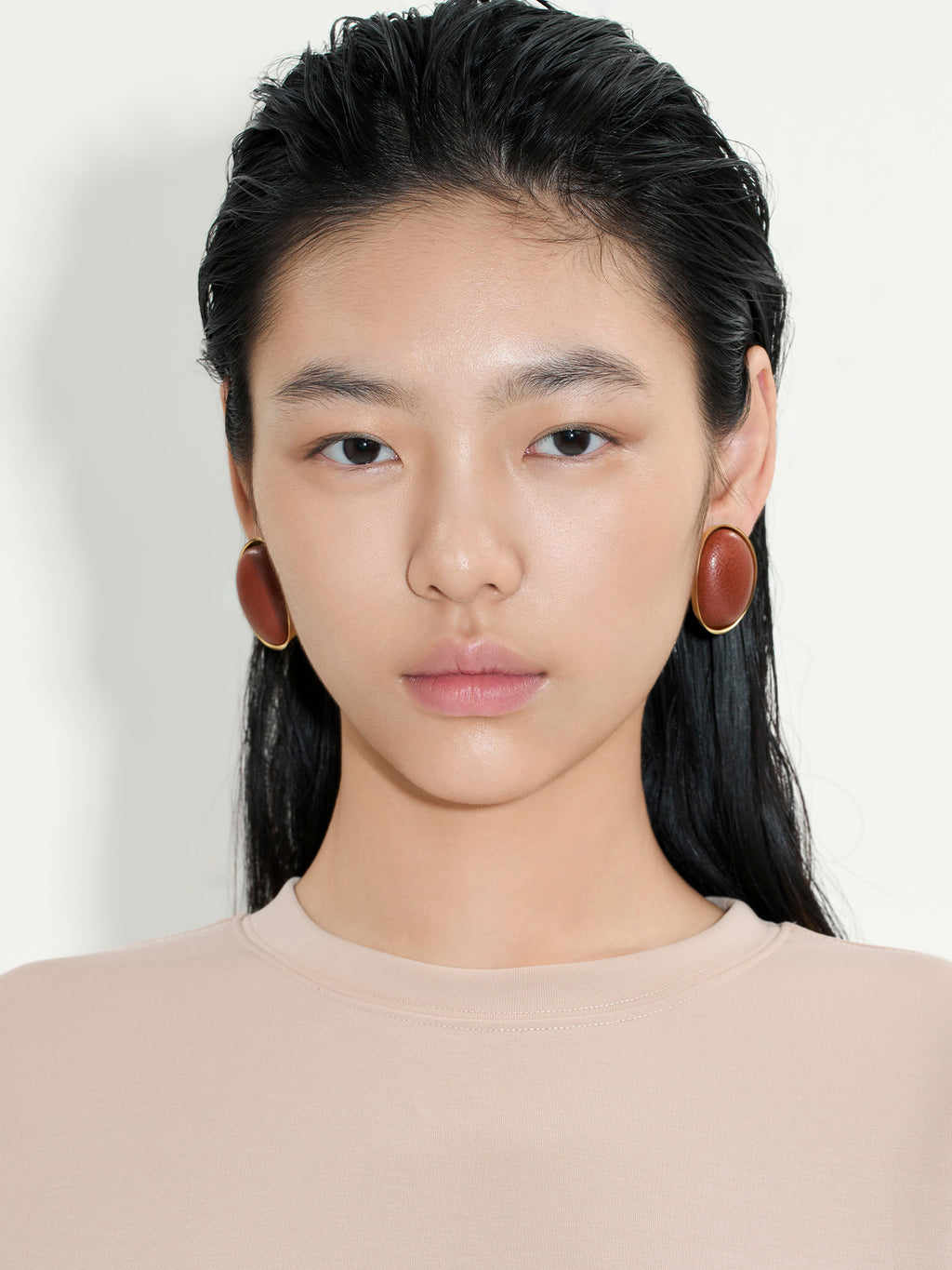 CURVED LEATHER-WRAPPED EARRINGS