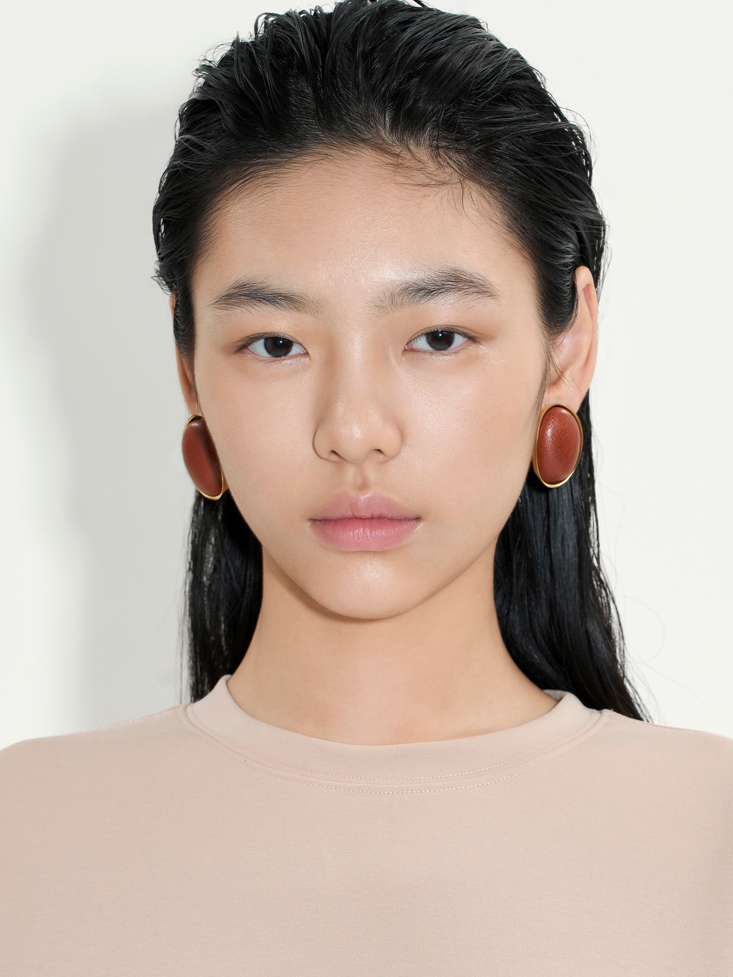 CURVED LEATHER-WRAPPED EARRINGS