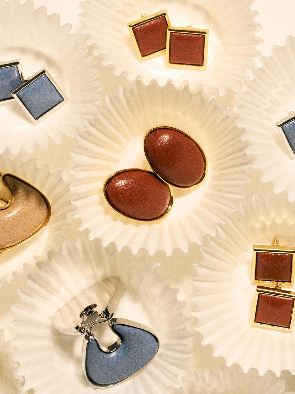 CURVED LEATHER-WRAPPED EARRINGS