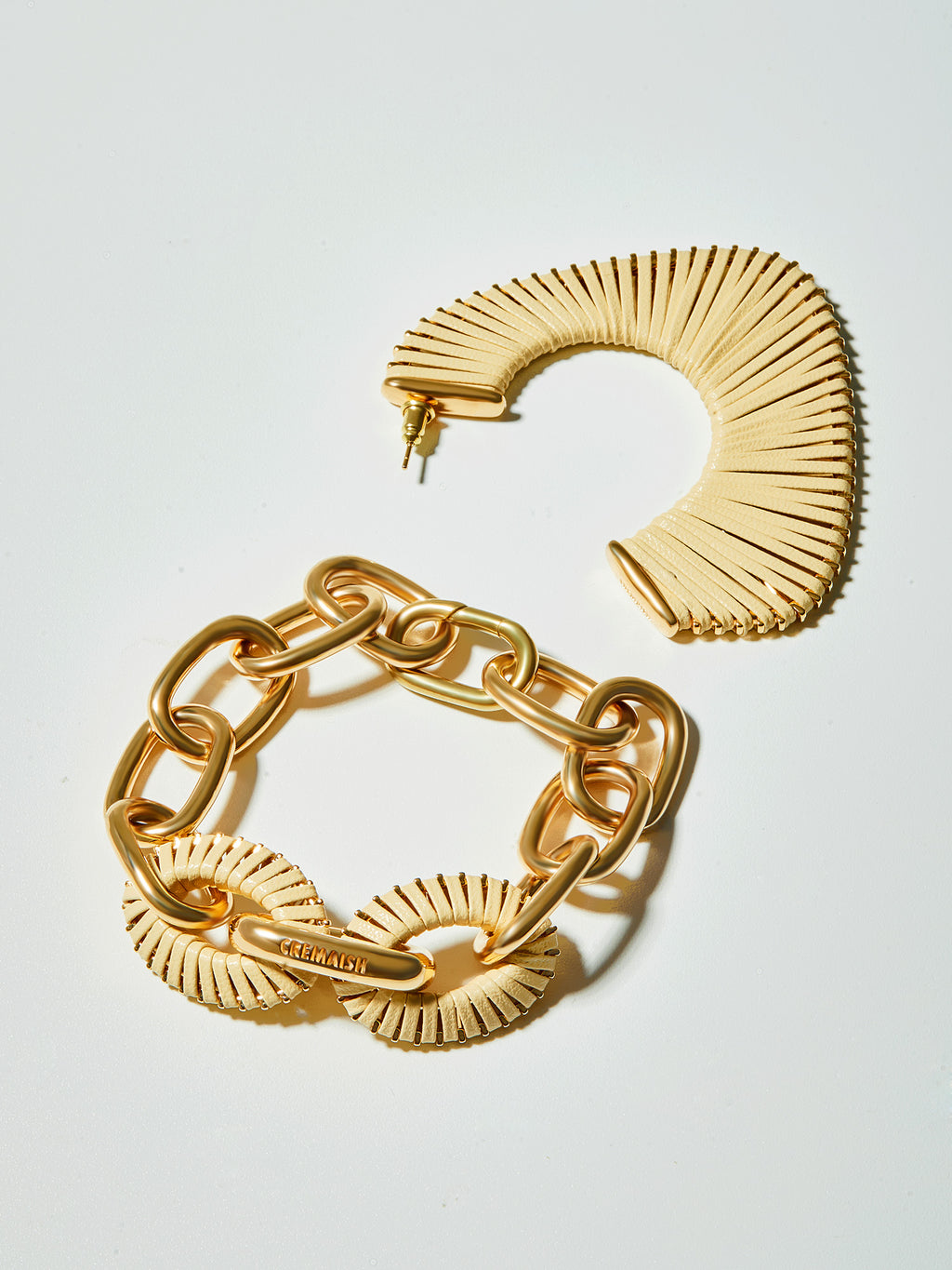 FAN SHAPE LEATHER WRAPPED EARRINGS